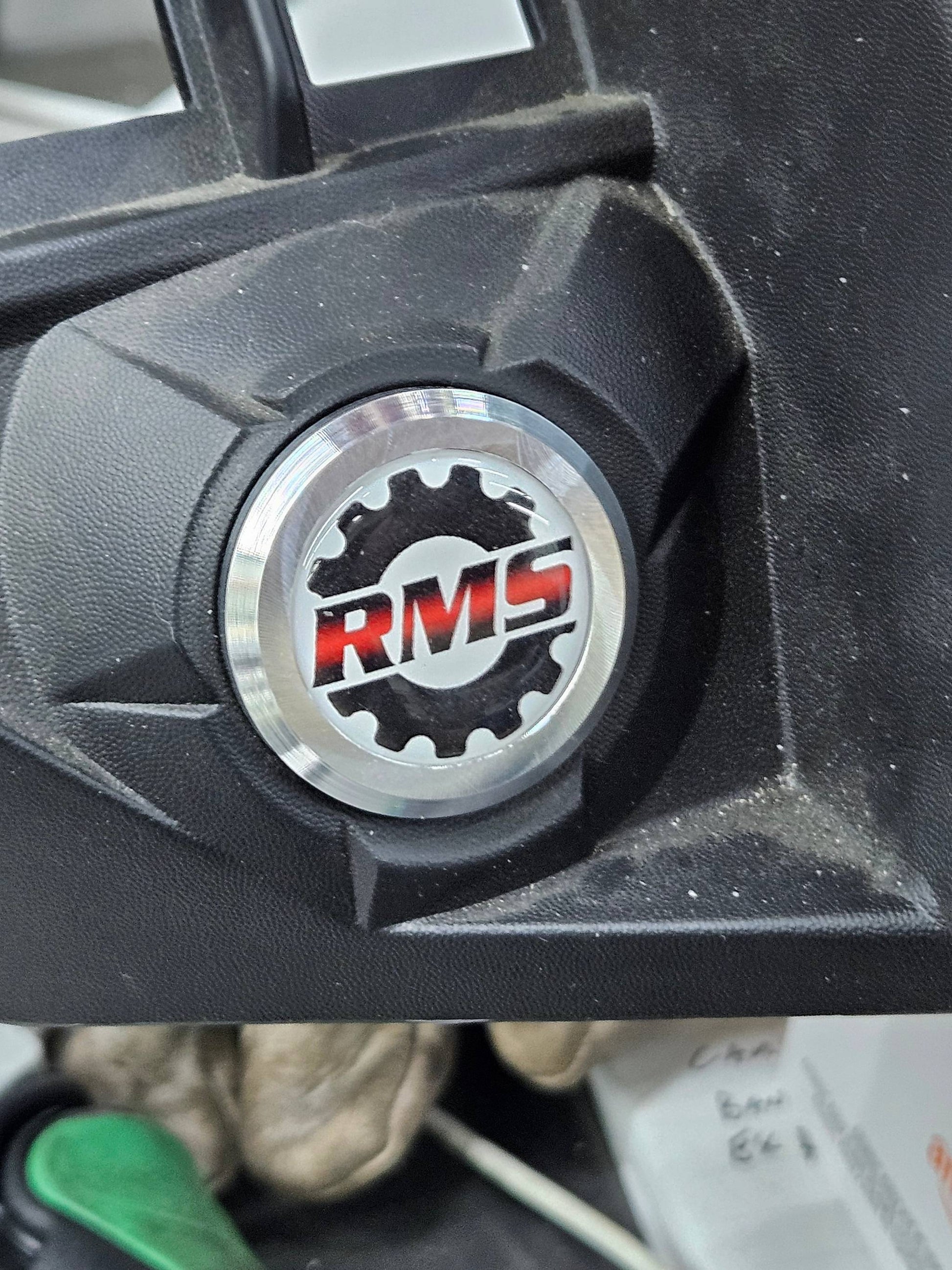 DESS Block Off Plug stickered installed in console raw in color.