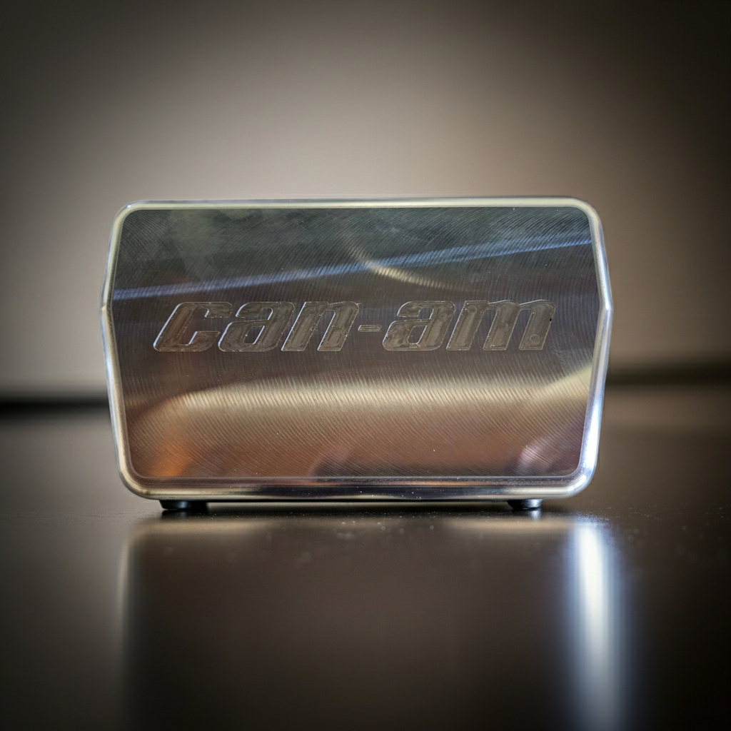 Billet Rugged Radio Cover with engraved Can-Am logo in raw aircraft aluminum finish - Made in USA by Reed Made Speed