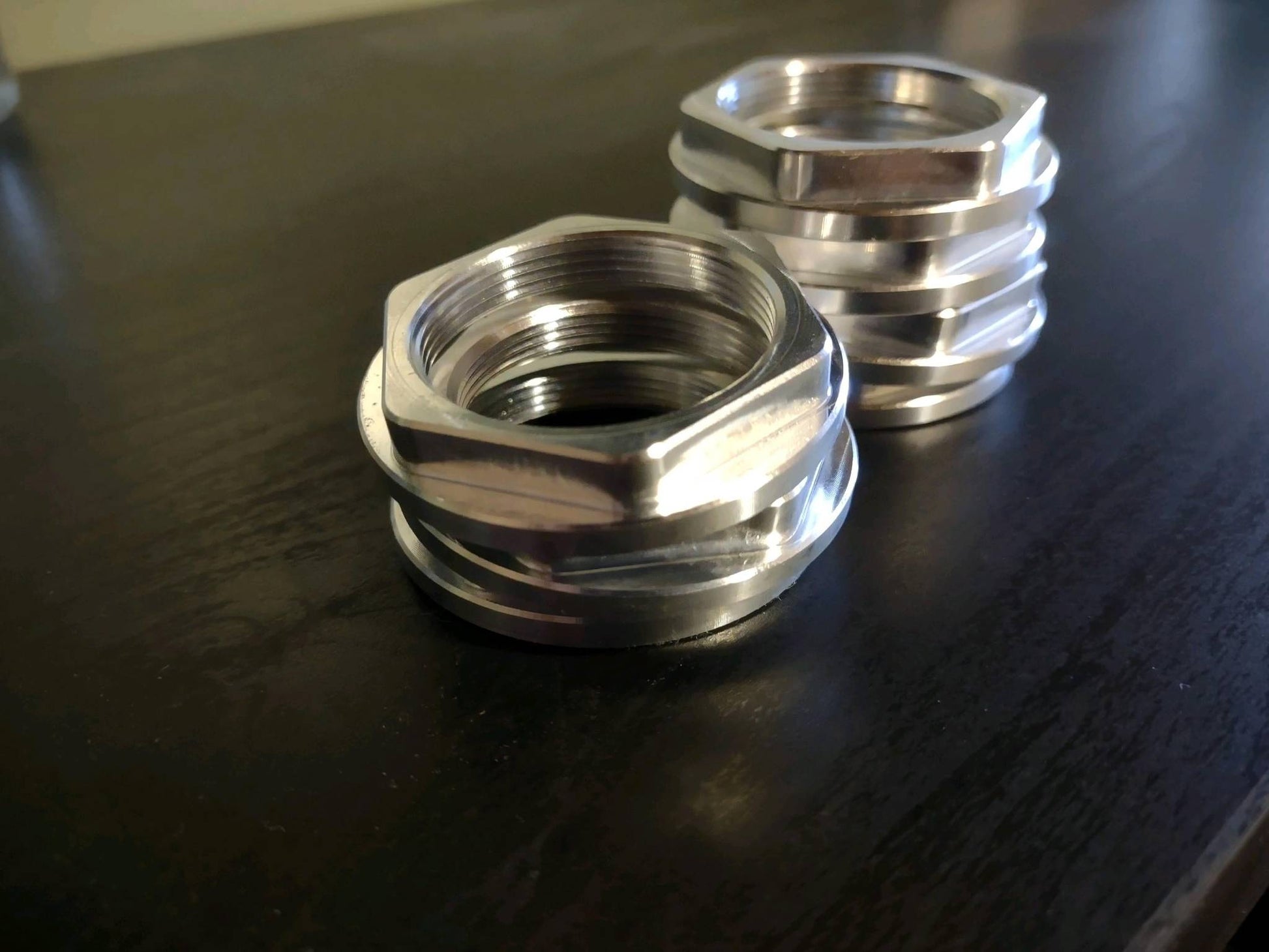 CNC-machined mounting nuts for Can-Am X3 Switch Pros 9100 mount by Reed Made Speed
